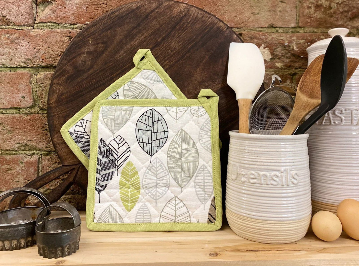 Two Fabric Pot or Pan Mats With Contemporary Green Leaf Print Design - Daily Buy